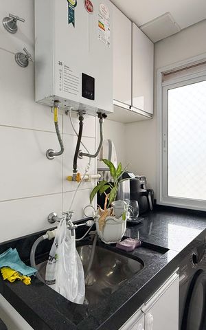 Apartamento à venda com 49m², 2 quartos e 1 vaga Apartamento à venda com 49m², 2 quartos e 1 vagaCozinha e Área de Serviço