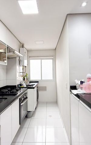 Apartamento à venda com 49m², 2 quartos e 1 vaga Apartamento à venda com 49m², 2 quartos e 1 vagaCozinha e Área de Serviço