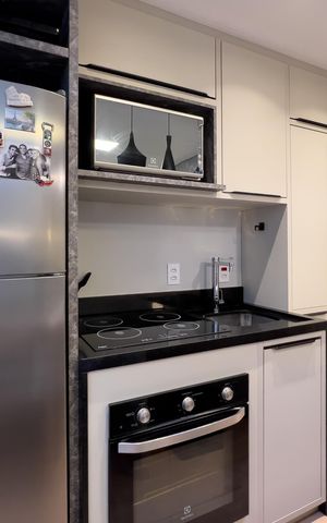 Studio à venda com 42m², 1 quarto e sem vaga Studio à venda com 42m², 1 quarto e sem vagaCozinha e área de serviço