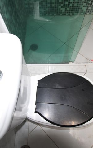 Casa para alugar com 100m², 2 quartos e 2 vagasBanheiro da Suíte 1
