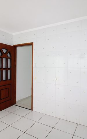 Casa para alugar com 100m², 2 quartos e 2 vagasCozinha