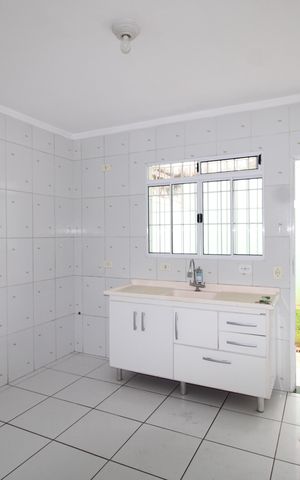 Casa para alugar com 100m², 2 quartos e 2 vagasCozinha