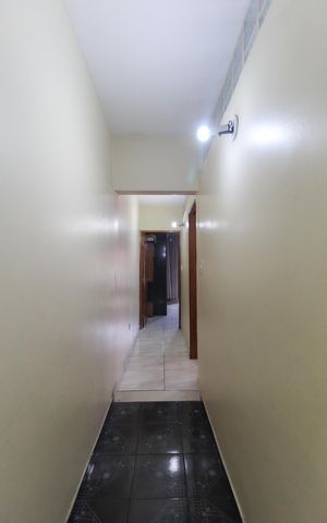 Casa à venda com 180m², 5 quartos e 2 vagas Casa à venda com 180m², 5 quartos e 2 vagasCorredor da Casa 2