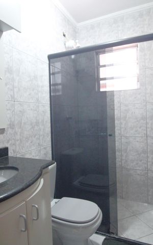 Casa à venda com 217m², 3 quartos e 2 vagasBanheiro comum
