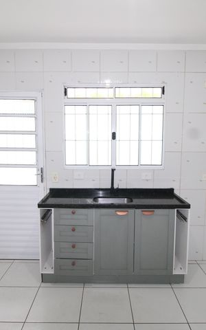 Casa para alugar com 100m², 2 quartos e 2 vagasCozinha