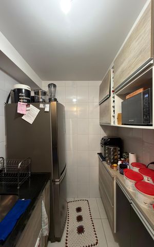 Apartamento à venda com 60m², 2 quartos e 1 vaga Apartamento à venda com 60m², 2 quartos e 1 vagaCozinha e Área de Serviço