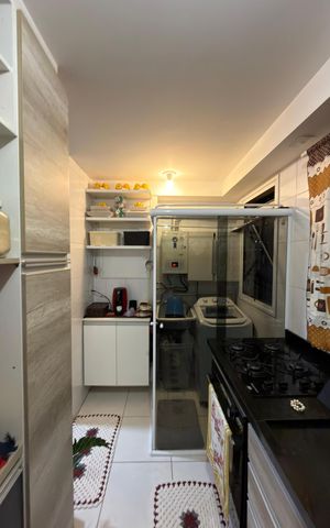 Apartamento à venda com 60m², 2 quartos e 1 vaga Apartamento à venda com 60m², 2 quartos e 1 vagaCozinha e Área de Serviço
