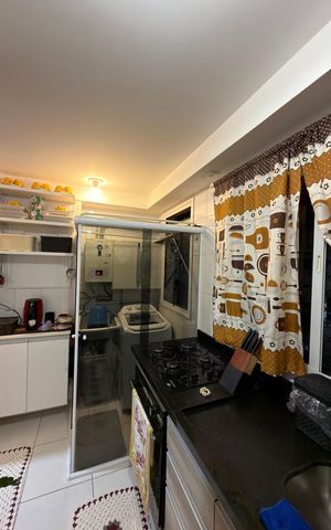 Apartamento à venda com 60m², 2 quartos e 1 vaga Apartamento à venda com 60m², 2 quartos e 1 vagaCozinha e Área de Serviço