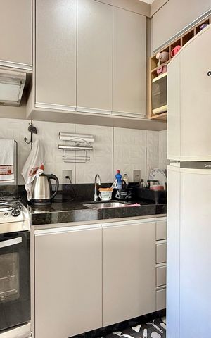 Apartamento à venda com 53m², 2 quartos e 1 vaga Apartamento à venda com 53m², 2 quartos e 1 vagaCozinha e Área de Serviço