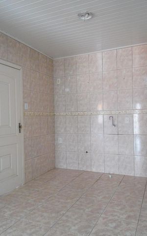 Casa para alugar com 100m², 2 quartos e 2 vagasCozinha