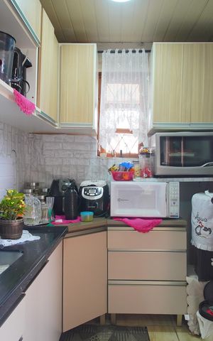Casa à venda com 90m², 2 quartos e 2 vagasCozinha