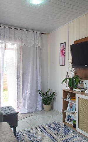 Casa à venda com 90m², 2 quartos e 2 vagasSala 
