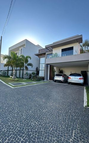 Casa de condomínio à venda com 250m², 3 quartos e 4 vagas Casa de condomínio à venda com 250m², 3 quartos e 4 vagasFachada