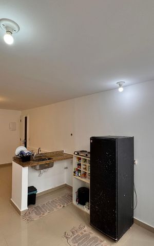 Casa de condomínio para alugar com 65m², 2 quartos e 1 vaga Casa de condomínio para alugar com 65m², 2 quartos e 1 vagaCozinha e Área de Serviço