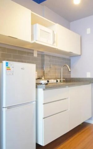 Studio à venda com 28m², 1 quarto e sem vaga Studio à venda com 28m², 1 quarto e sem vagaCozinha