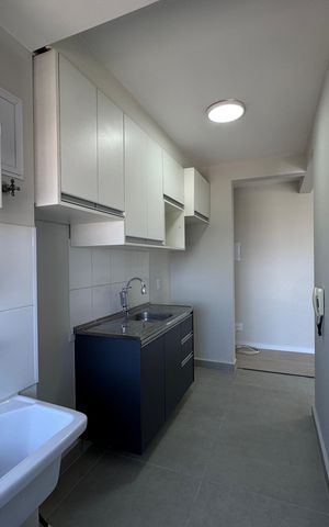 Apartamento à venda com 45m², 2 quartos e 1 vaga Apartamento à venda com 45m², 2 quartos e 1 vagaCozinha e Área de Serviço