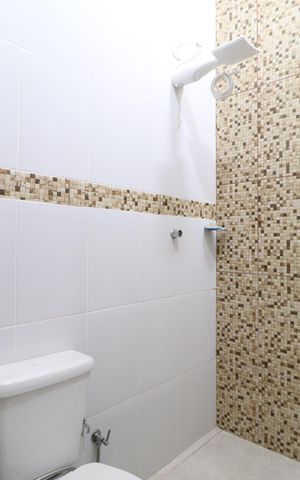 Casa para alugar com 53m², 2 quartos e 2 vagasBanheiro Social