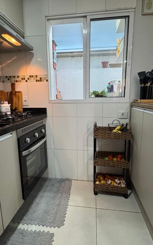 Casa de condomínio à venda com 59m², 2 quartos e 2 vagas Casa de condomínio à venda com 59m², 2 quartos e 2 vagasCozinha