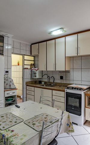 Casa à venda com 120m², 3 quartos e 1 vaga Casa à venda com 120m², 3 quartos e 1 vagaCozinha