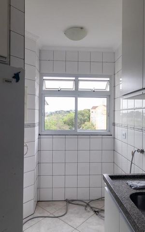 Apartamento à venda com 60m², 3 quartos e 1 vaga Apartamento à venda com 60m², 3 quartos e 1 vagaCozinha e Área de Serviço