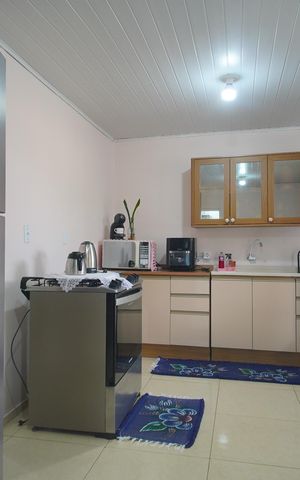 Casa para alugar com 98m², 2 quartos e 2 vagasCozinha