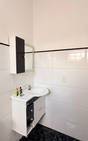 Casa de condomínio à venda com 124m², 2 quartos e 2 vagasBanheiro da Suíte