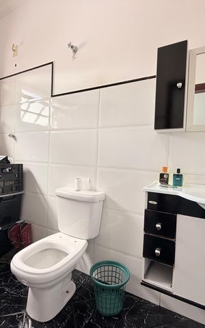 Casa de condomínio à venda com 124m², 2 quartos e 2 vagasBanheiro da Suíte