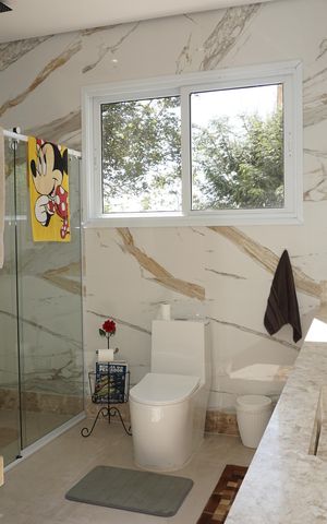 Casa de condomínio para alugar com 600m², 6 quartos e 4 vagasBanheiro da Suíte
