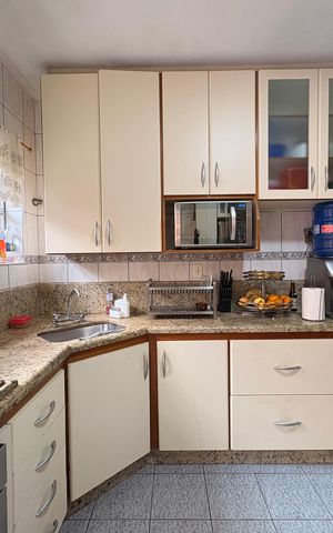 Casa à venda com 148m², 2 quartos e 2 vagas Casa à venda com 148m², 2 quartos e 2 vagasCozinha