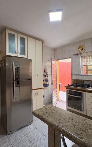 Casa à venda com 148m², 2 quartos e 2 vagas Casa à venda com 148m², 2 quartos e 2 vagasCozinha