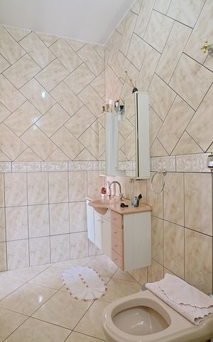 Casa à venda com 250m², 4 quartos e 5 vagasBanheiro do Quarto 3