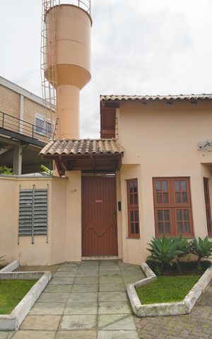 Casa de condomínio à venda com 112m², 3 quartos e 1 vagaFachada