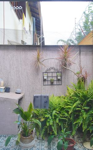 Casa de condomínio à venda com 112m², 3 quartos e 1 vagaQuintal