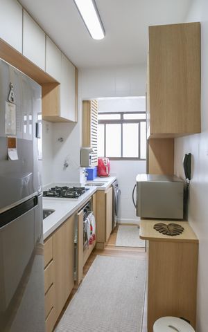 Apartamento à venda com 55m², 2 quartos e 2 vagas Apartamento à venda com 55m², 2 quartos e 2 vagasCozinha e Área de Serviço