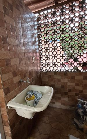 Casa à venda com 138m², 5 quartos e 1 vagaÁrea de Serviço do quarto anexo