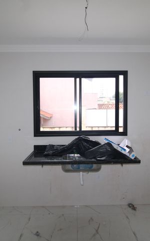 Casa à venda com 108m², 3 quartos e 3 vagasSala / Cozinha