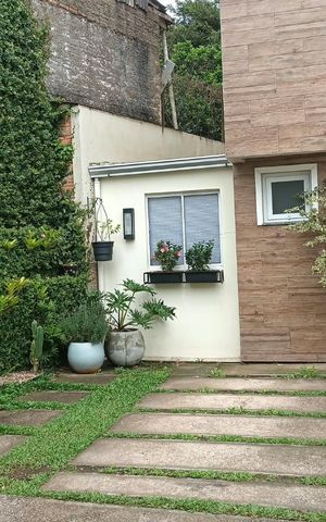 Casa de condomínio à venda com 107m², 3 quartos e 2 vagasFachada