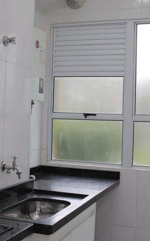 Apartamento à venda com 49m², 2 quartos e 1 vaga Apartamento à venda com 49m², 2 quartos e 1 vagaCozinha e Área de Serviço