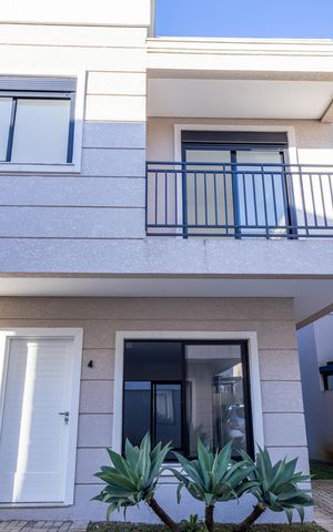 Casa de condomínio à venda com 117m², 2 quartos e 2 vagas Casa de condomínio à venda com 117m², 2 quartos e 2 vagasFachada