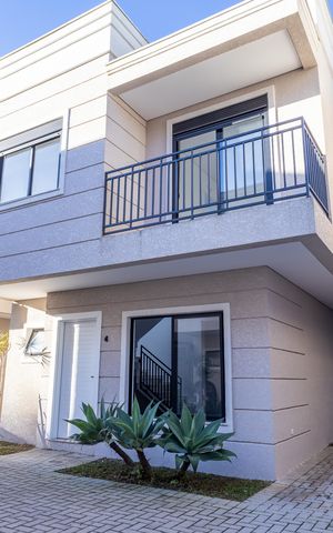 Casa de condomínio à venda com 117m², 2 quartos e 2 vagas Casa de condomínio à venda com 117m², 2 quartos e 2 vagasFachada