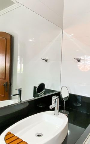Casa à venda com 450m², 4 quartos e 3 vagas Casa à venda com 450m², 4 quartos e 3 vagasBanheiro da Suíte