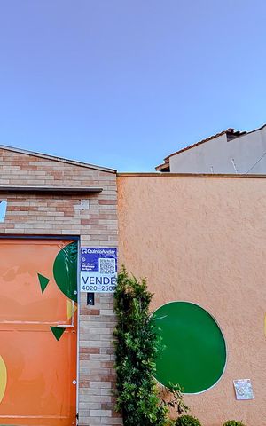 Casa à venda com 350m², 5 quartos e 4 vagasFachada com Placa
