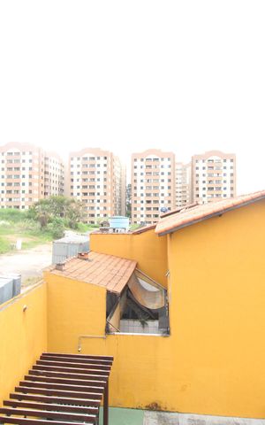 Casa de condomínio à venda com 72m², 3 quartos e 2 vagasVaranda do quarto 1