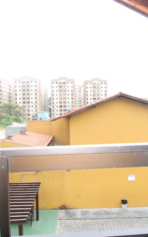 Casa de condomínio à venda com 72m², 3 quartos e 2 vagasVaranda do quarto 1