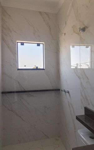 Casa à venda com 81m², 3 quartos e 2 vagas Casa à venda com 81m², 3 quartos e 2 vagasBanheiro da Suíte