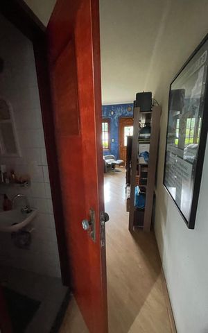 Casa de condomínio à venda com 77m², 2 quartos e 2 vagas Casa de condomínio à venda com 77m², 2 quartos e 2 vagasCorredor