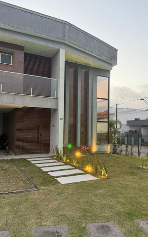 Casa de condomínio para alugar com 212m², 3 quartos e 4 vagas Casa de condomínio para alugar com 212m², 3 quartos e 4 vagasFachada
