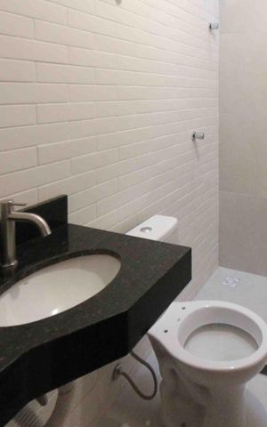 Casa à venda com 84m², 2 quartos e 2 vagasBanheiro da Suíte