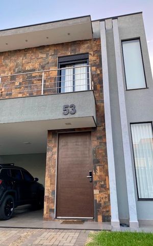 Casa de condomínio à venda com 200m², 2 quartos e 2 vagasFachada