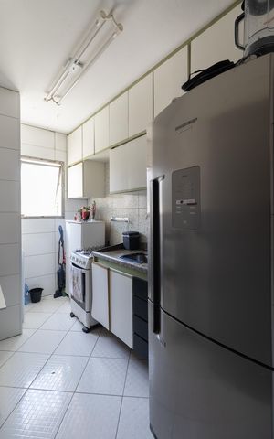 Apartamento à venda com 50m², 2 quartos e 1 vaga Apartamento à venda com 50m², 2 quartos e 1 vagaCozinha e Área de Serviço